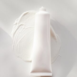 Picture of a bottle of lotion smeared