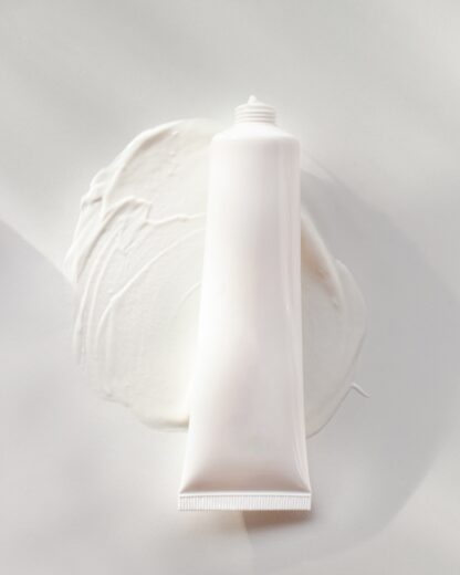 Picture of a bottle of lotion smeared