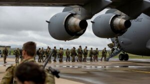 Picture of troops loading onto a plane