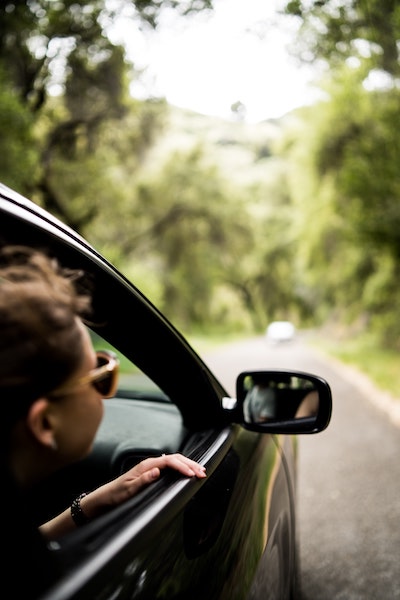 Picture of a car driving down a road